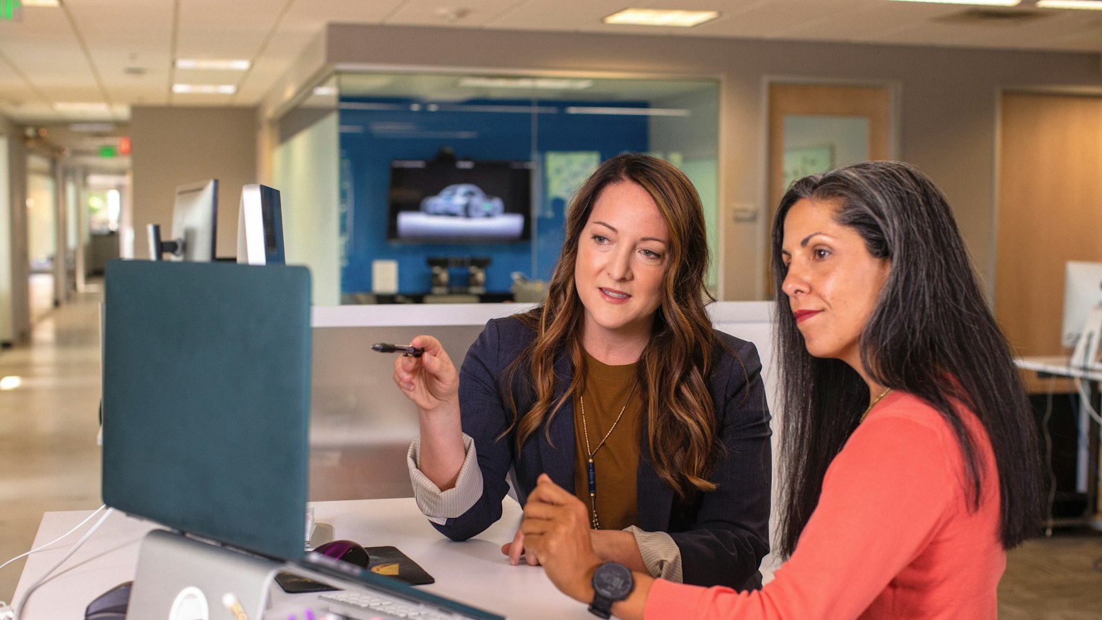 Hanso AI account manager reviewing an AI automation dashboard with a small business owner